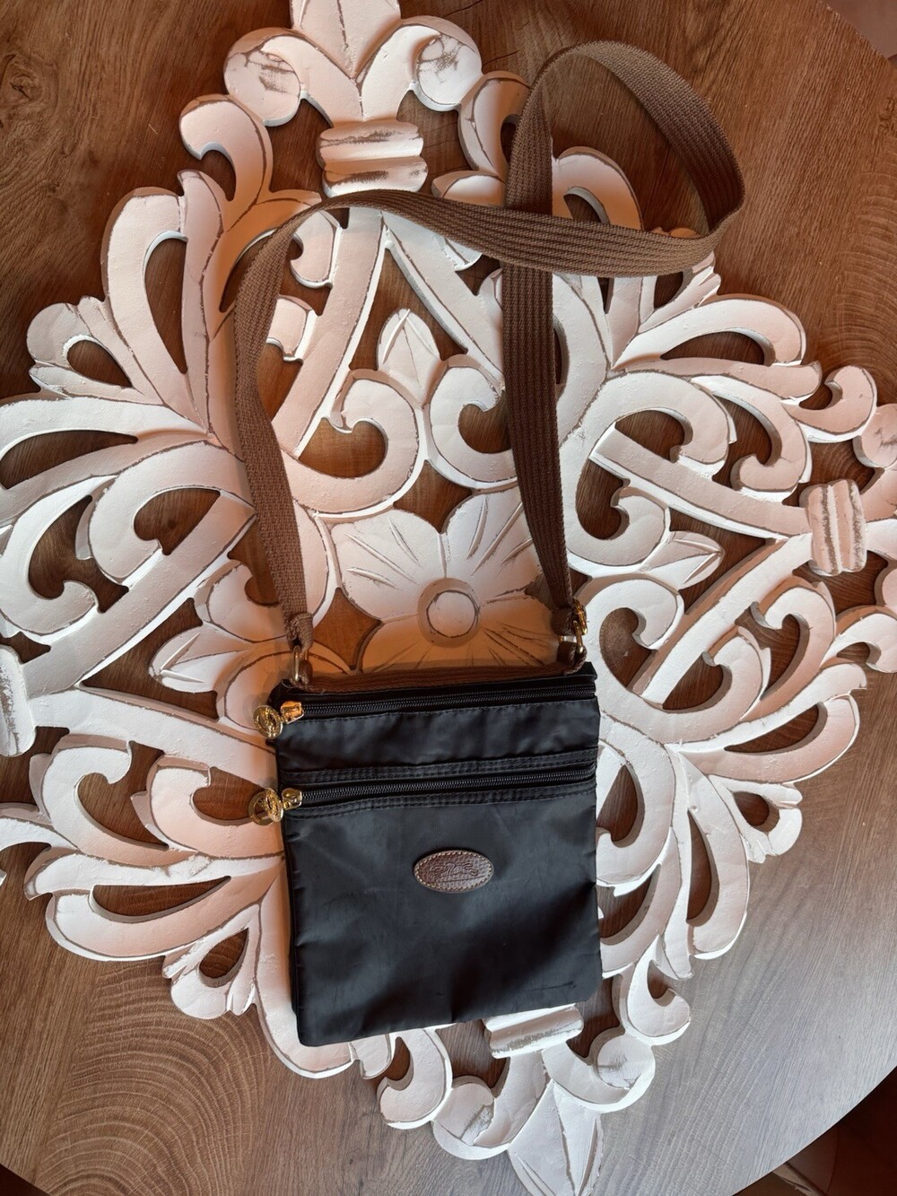 Longchamp Crossbody Bag Black Vinyl With Gold Accents And A Brown Strap
